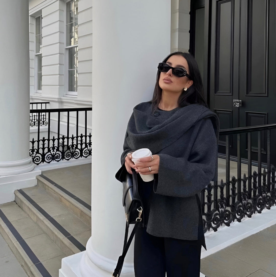 Women's effortless drape cape coat, perfect for elegant fall fashion and chic transitional style.