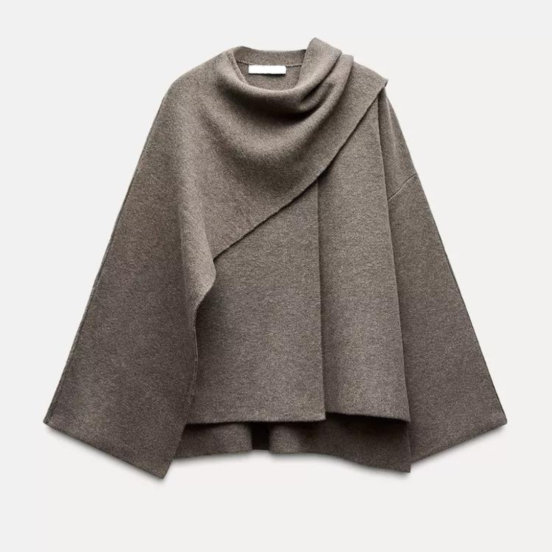 Chic women's drape coat, an essential piece of outerwear for elegant and modern fall fashion.