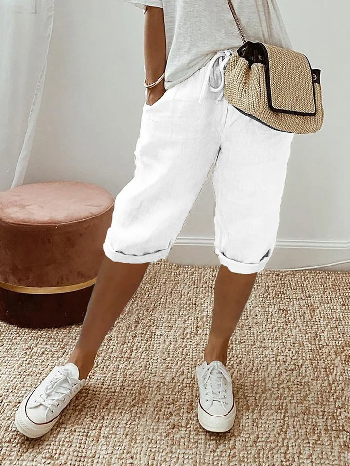 Practical women's casual shorts, relaxed fit with pockets & elastic drawstring waist, great for active summer days.