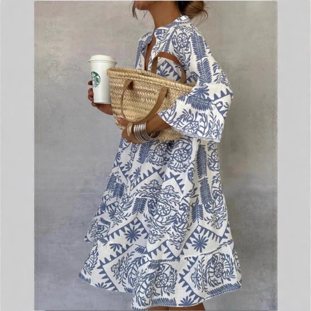 Women's Effortless Floral Sundress with tiered skirt & elbow sleeves, perfect for summer.