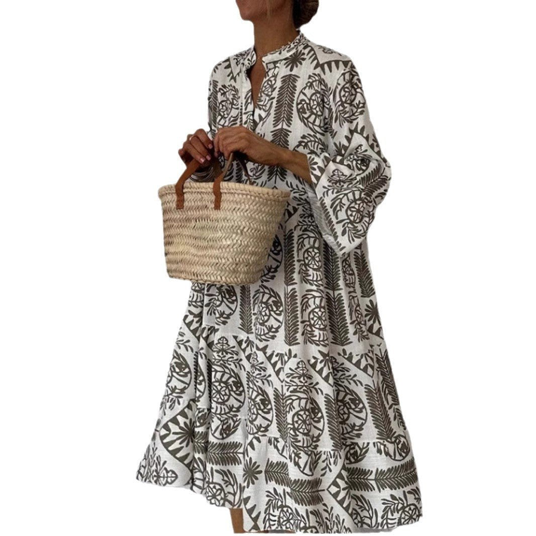 Relaxed fit floral print sundress with tiered skirt & elbow sleeves, great for women's casual summer wear.