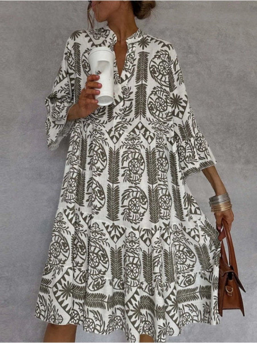 Effortless women's floral sundress with a tiered skirt, elbow sleeves & comfortable relaxed fit.