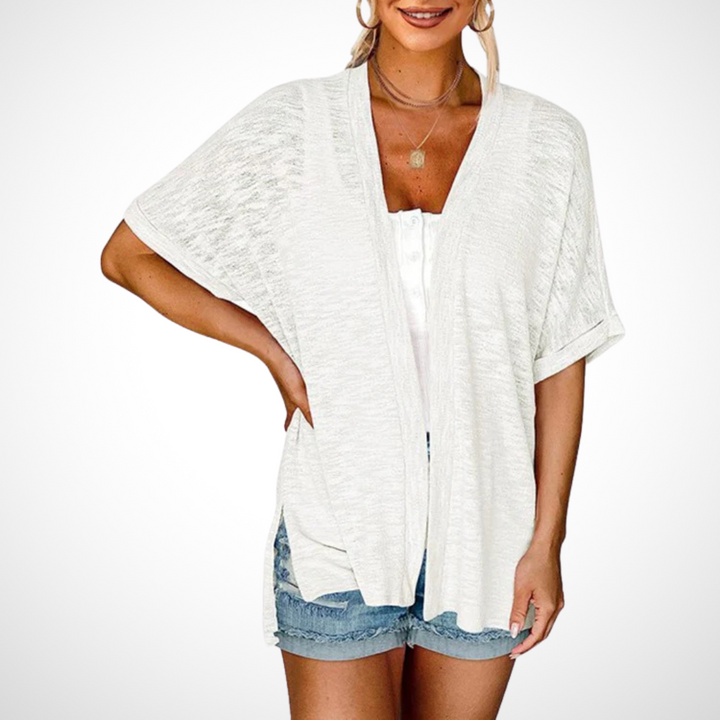 Elegant women's short sleeve flowing cardigan. Comfortable & versatile, ideal for summer fashion layering.