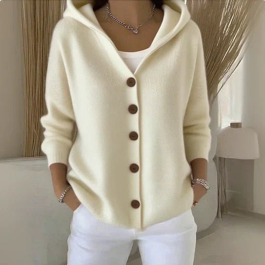 Cozy relaxed fit women's hooded cardigan sweater with button front, ideal for comfort and warmth.