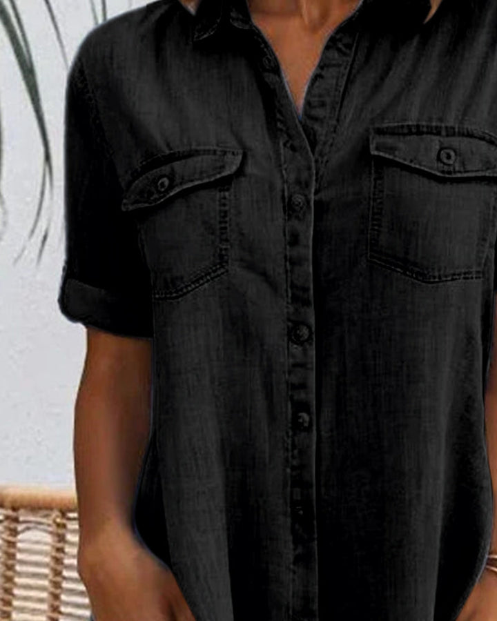 Close-up of the fabric on a women's lightweight denim-look dress, highlighting its soft texture.