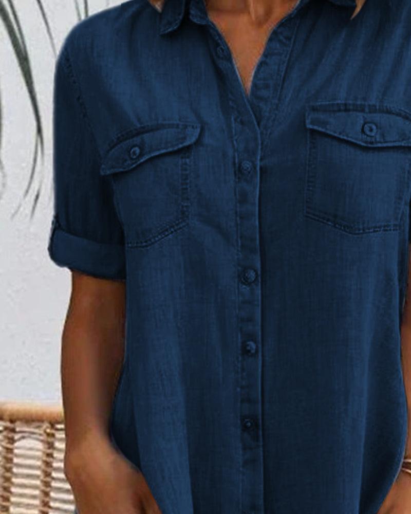 Model wearing a comfortable women's lightweight denim-look dress, showcasing its flattering fit.
