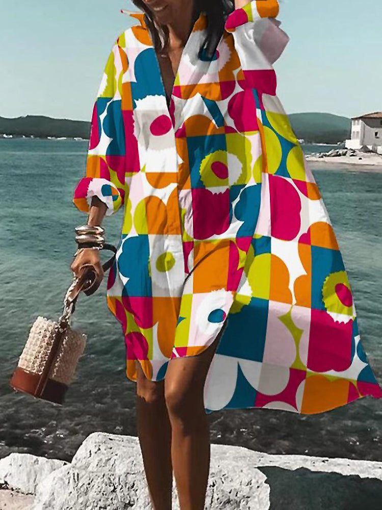 Casual women's midi shirt dress featuring button closure, short sleeves, and a comfortable relaxed fit.