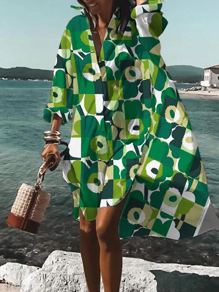 Oversized women's printed midi shirt dress with button-front, short sleeves, and a stylish relaxed fit.