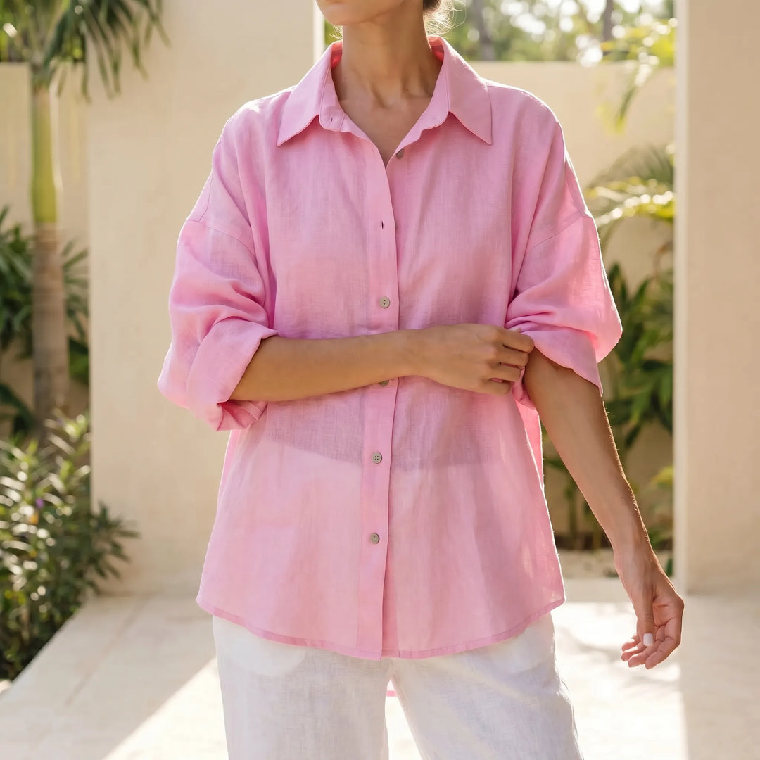 Women's effortless oversized button-down shirt in a relaxed fit, perfect for casual summer style.