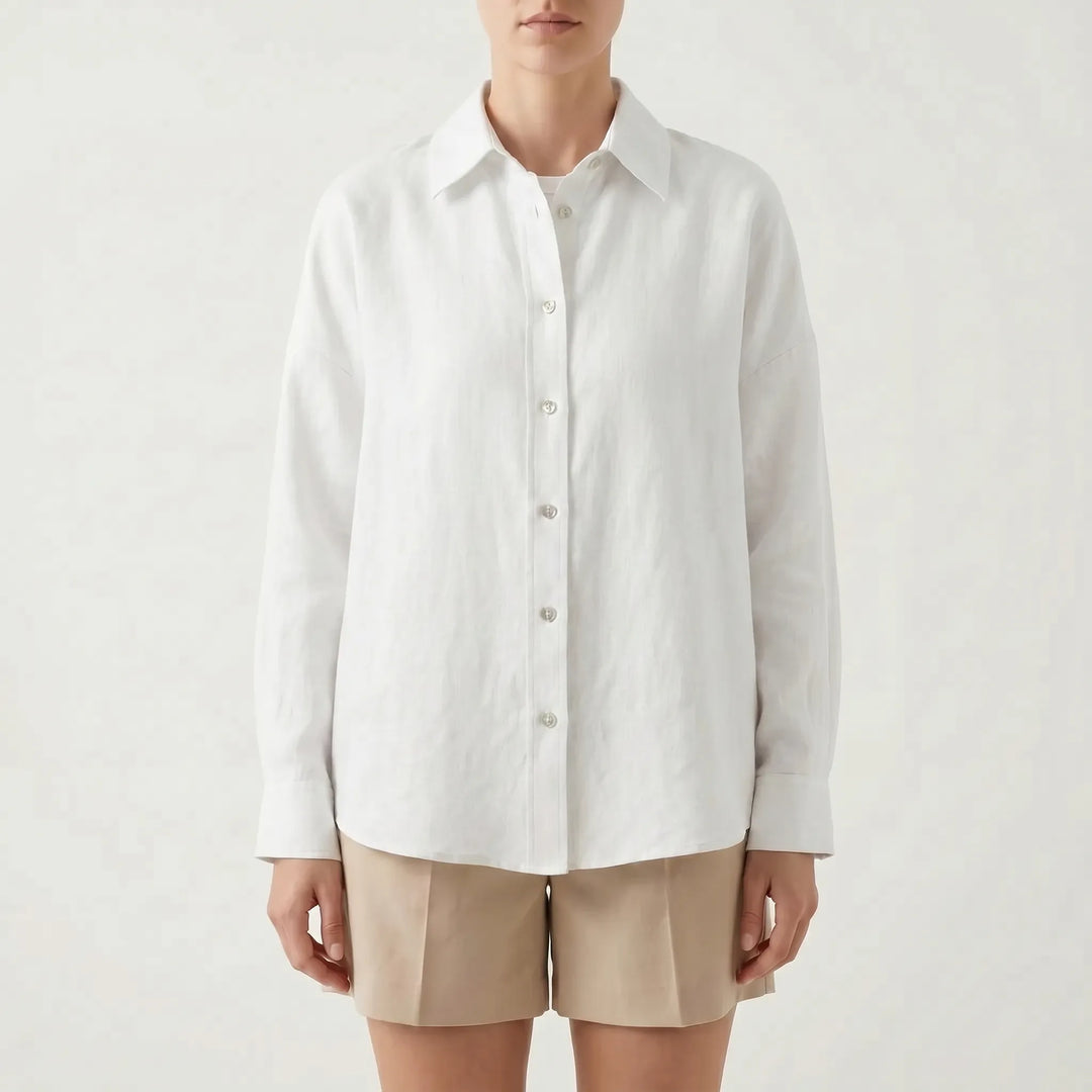 Classic women's oversized button-down shirt, a timeless casual top with a relaxed fit for everyday wear.