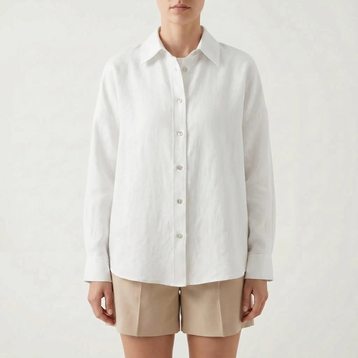 Classic women's oversized button-down shirt, a timeless casual top with a relaxed fit for everyday wear.