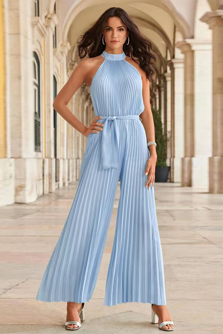Effortless light blue pleated jumpsuit for women, a versatile & comfortable one-piece outfit.