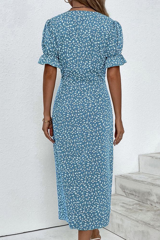 Elegant women's midi dress, beautifully pleated with a flowy design. Perfect for ladies fashion.