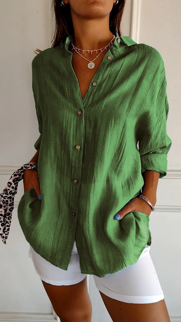 Versatile women's long sleeve collared shirt, oversized and casual for relaxed fashion.