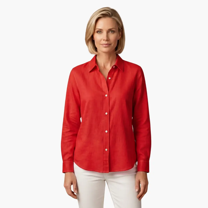 Stylish women's button-up shirt, featuring a comfortable relaxed fit and classic long sleeves.