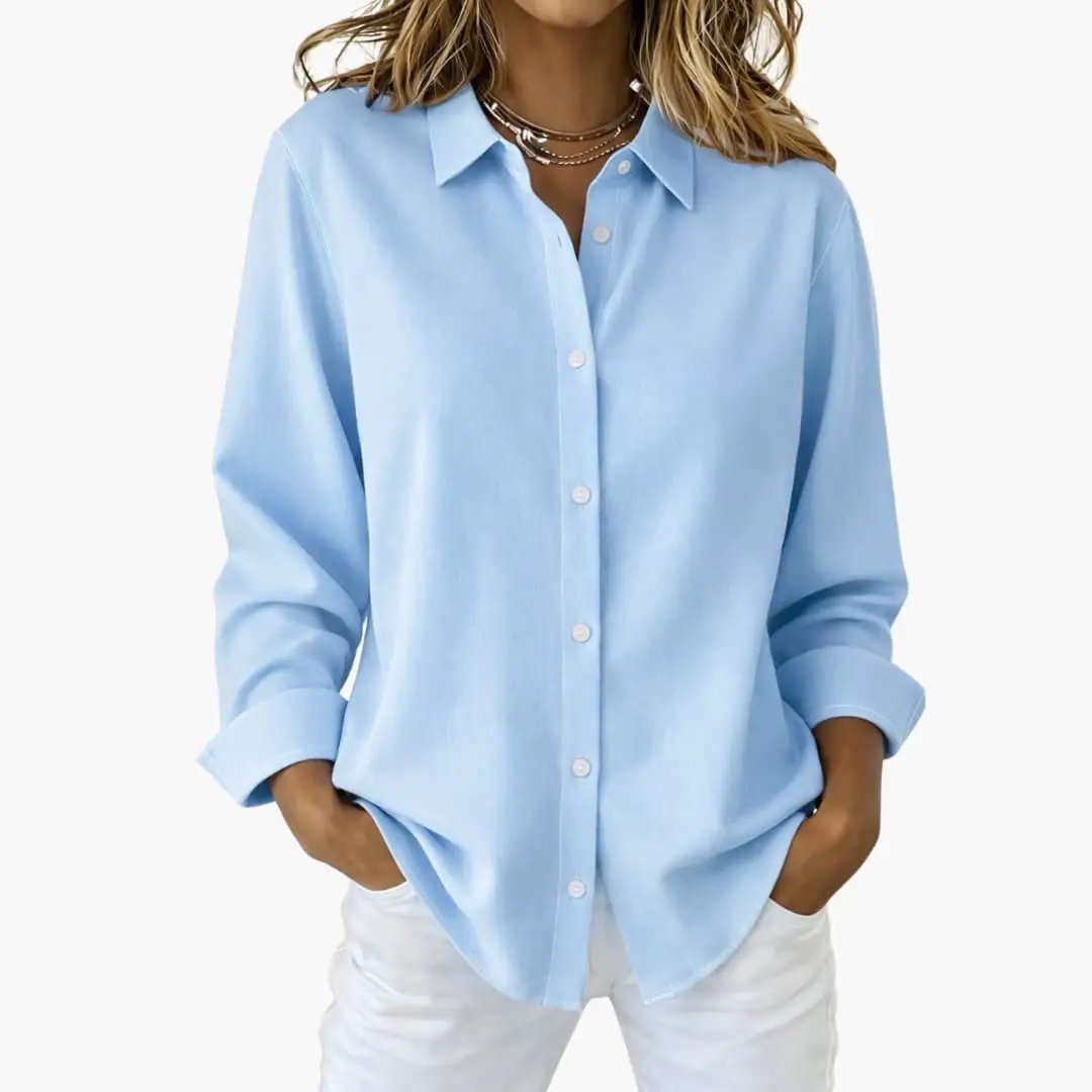 Comfortable women's relaxed fit button-up blouse; a versatile long sleeve shirt for everyday wear.