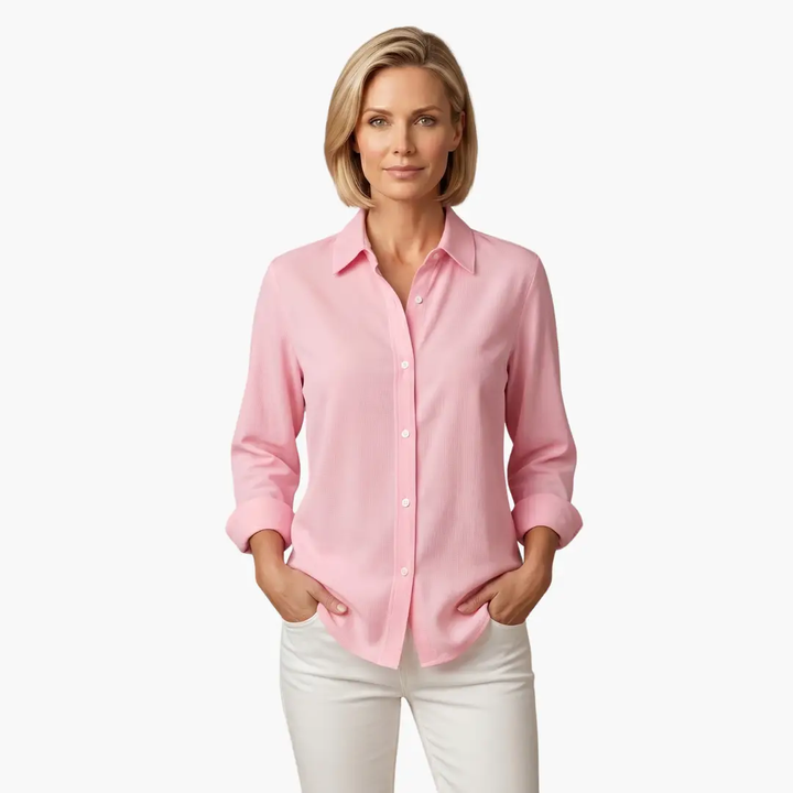 Versatile women's long sleeve button-up blouse, offering a relaxed fit for all-day comfort.