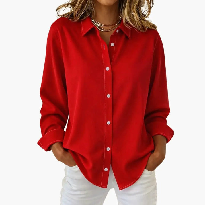 Everyday women's relaxed fit button-up shirt; a staple long sleeve blouse for any wardrobe.