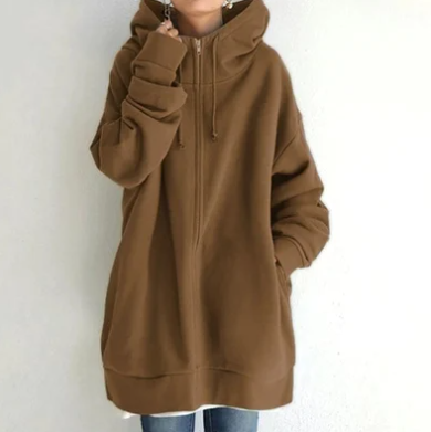 Front view of a women's relaxed fit full-zip hoodie. Stylish, versatile, and comfortable everyday wear.