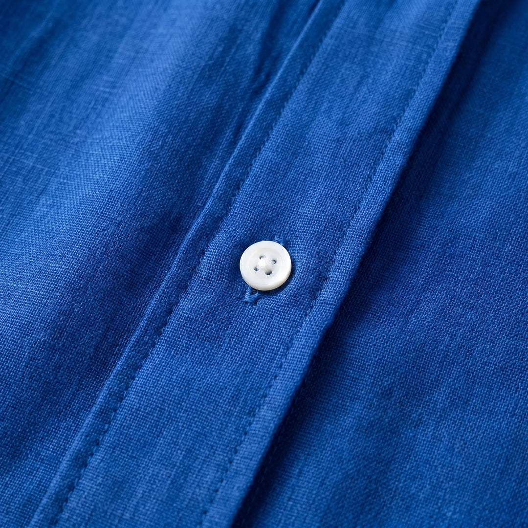 Casual long sleeve button-down blouse for women, relaxed fit. Ideal lightweight top for comfortable summer wear.