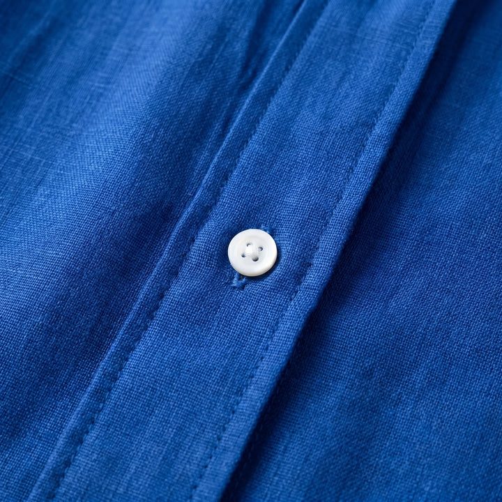 Casual long sleeve button-down blouse for women, relaxed fit. Ideal lightweight top for comfortable summer wear.