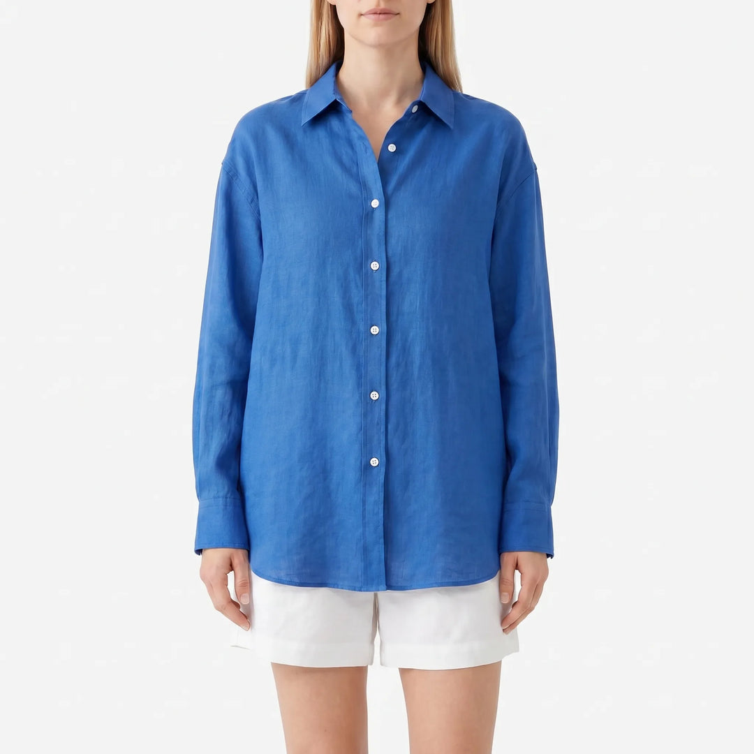 Comfortable women's summer blouse in a relaxed fit. Lightweight, long sleeve button-down top for casual elegance.