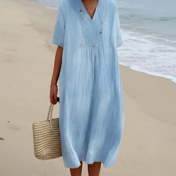 Women's effortless V-neck A-line midi summer dress, perfect for casual comfort & everyday wear.