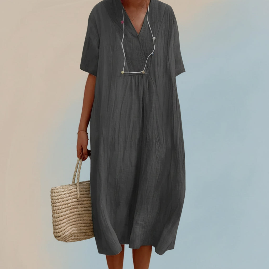 Stylish V-neck A-line women's summer dress, a comfortable & effortless midi ideal for vacation or casual outings.