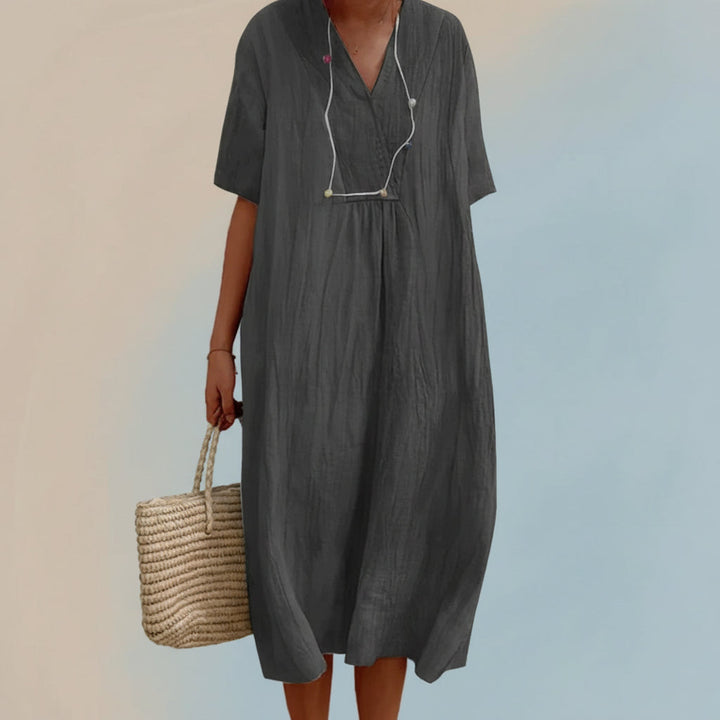 Stylish V-neck A-line women's summer dress, a comfortable & effortless midi ideal for vacation or casual outings.