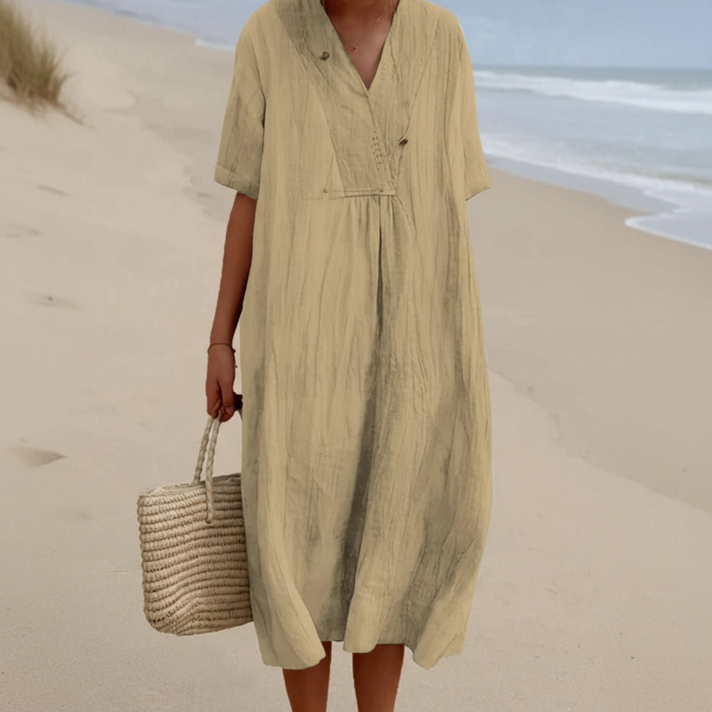 Women's casual V-neck A-line summer dress. Comfortable, lightweight midi design with a relaxed fit.