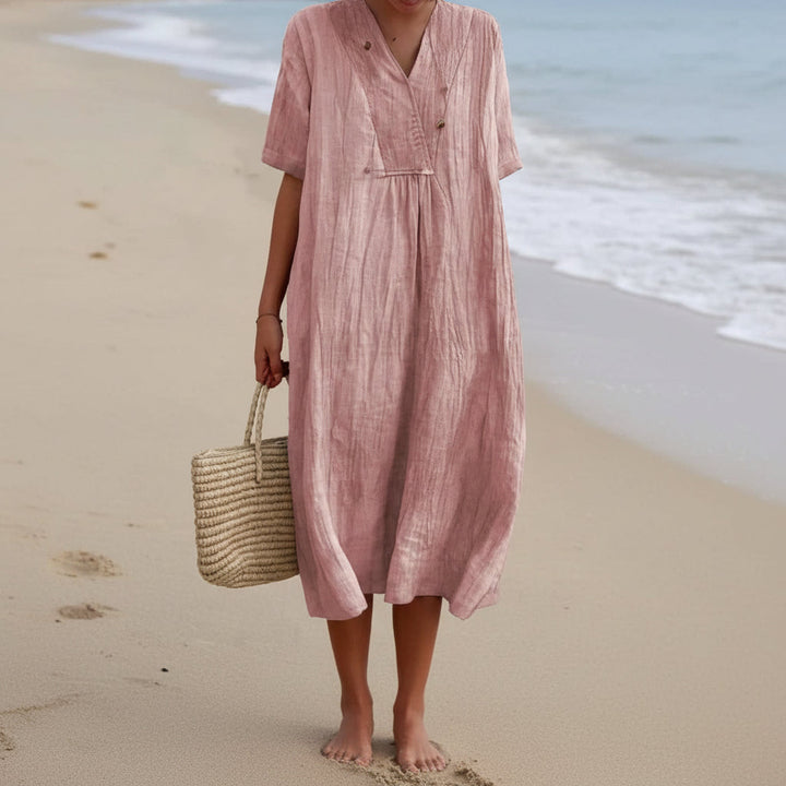 Versatile women's V-neck A-line summer midi dress. Effortless style, breezy comfort for vacation & daily wear.