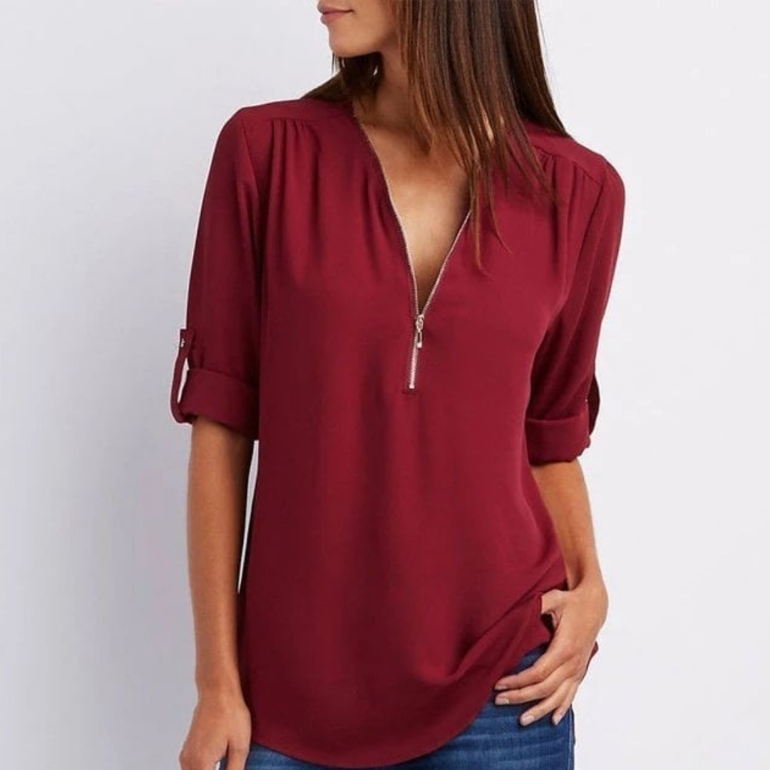 Stylish women's V-neck top with roll-up sleeves & zip front, a versatile choice for casual or office looks.
