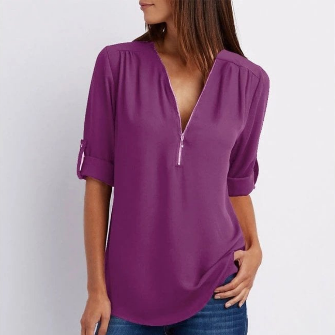 Chic women's V-neck blouse, long sleeves, and practical roll-up feature for effortless, adaptable styling.