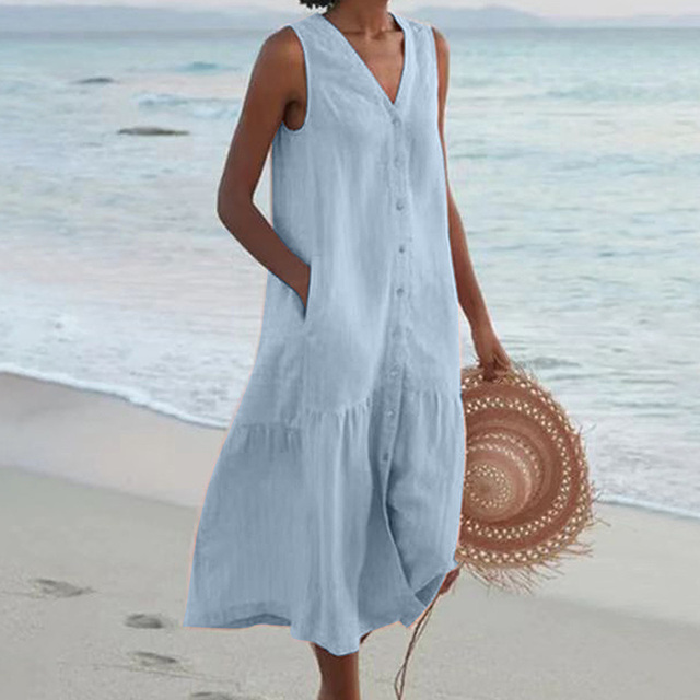 Flowy sleeveless midi dress for women, ideal for a stylish summer vacation or everyday look.