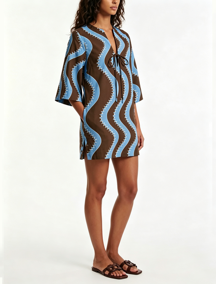 Breezy wave print mini shift dress for women, with a collar and elbow sleeves, ideal for vacation or casual wear.