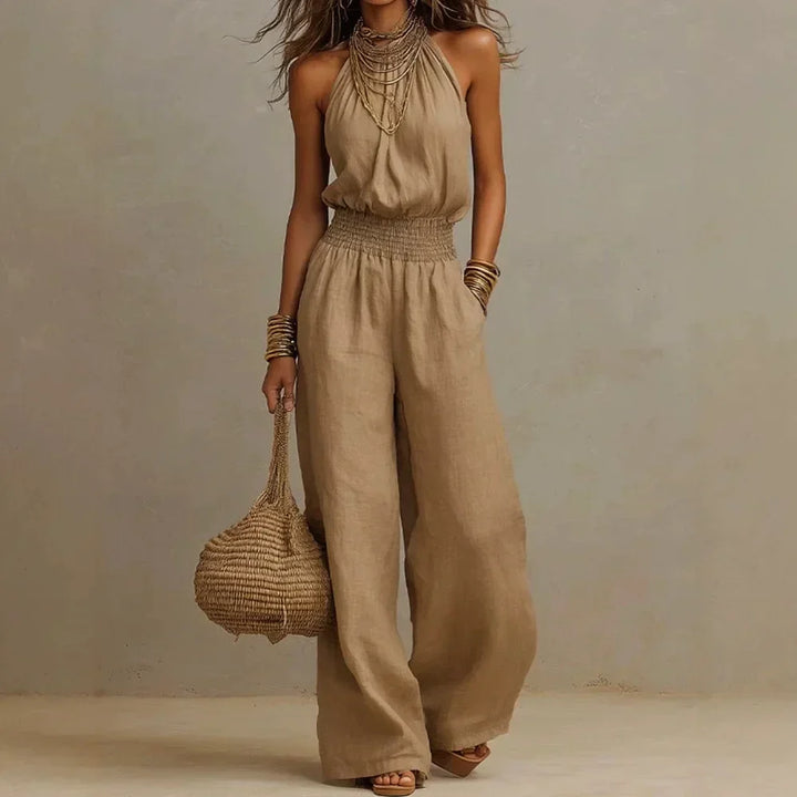 Women's effortless wide leg halter jumpsuit, perfect for comfortable summer wear & resort style.