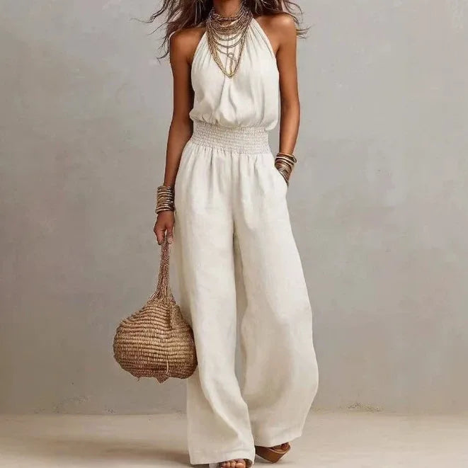 Flowing wide leg halter jumpsuit for women, offering effortless summer style & ultimate comfort.