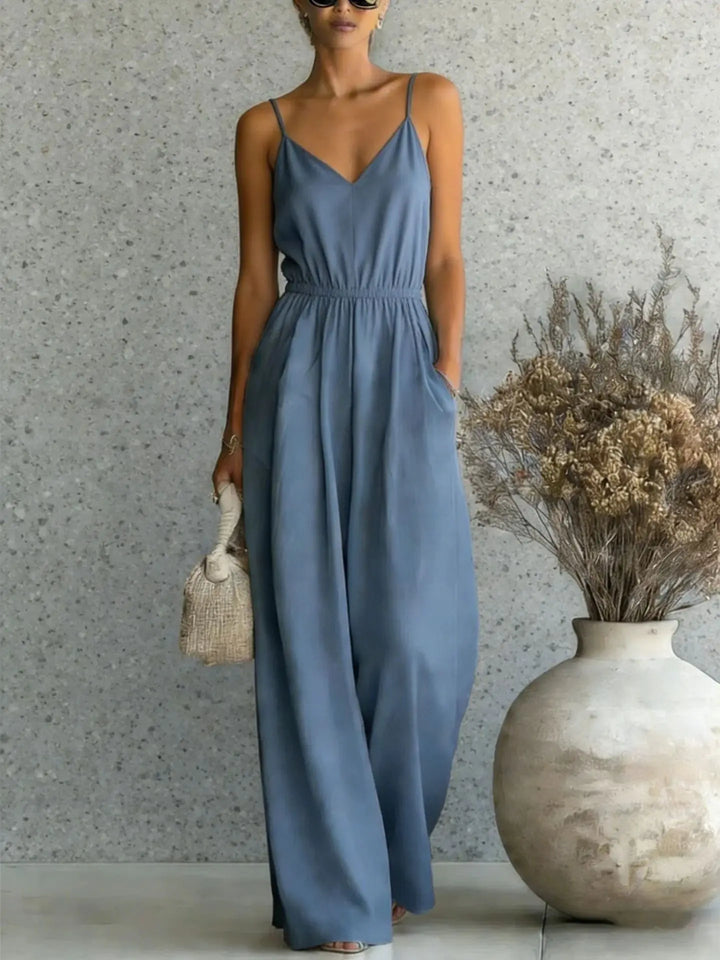 Women's casual wide-leg jumpsuit, sleeveless V-neck design. Comfortable & versatile one-piece for summer vacation.
