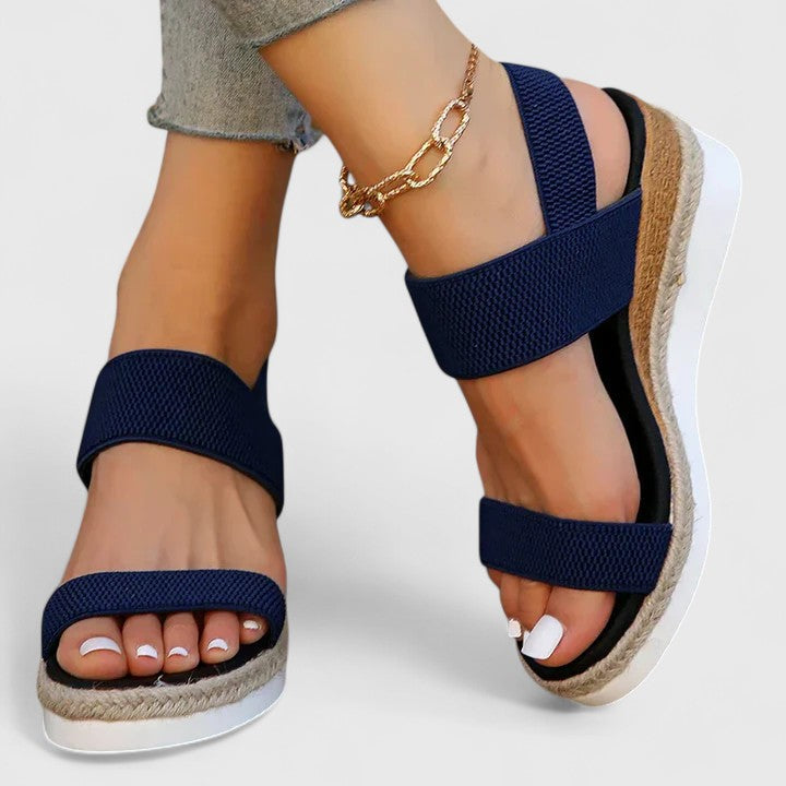 Comfortable women's espadrille wedge sandals with elastic open toe straps, ideal for all-day summer wear.