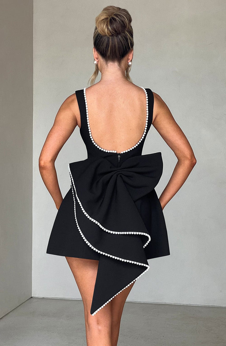 Stylish women's pearl trim A-line mini homecoming dress, a flattering party or cocktail evening dress.