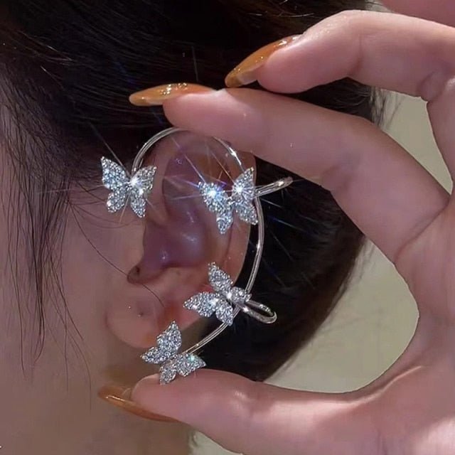Women's elegant adjustable gold clip-on earrings, piercing-free leaf design, a chic fashion accessory.