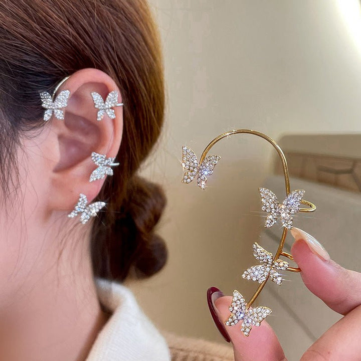 Adjustable white star design clip-on earrings for women, elegant piercing-free jewelry for any occasion.