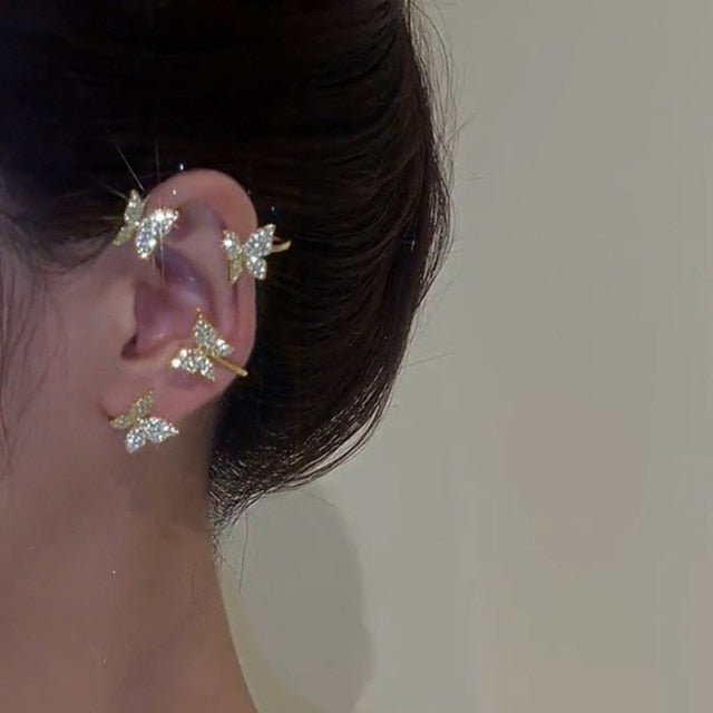 Women's elegant adjustable clip-on earrings, piercing-free ear clips with a pretty star design, white.
