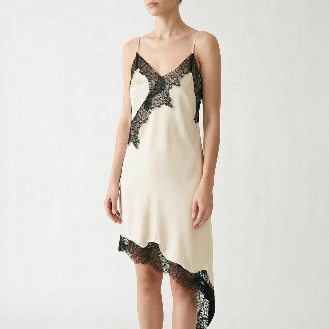 Summer women's V-neck slip dress with delicate lace & an asymmetric hem, elegant for warm evenings.