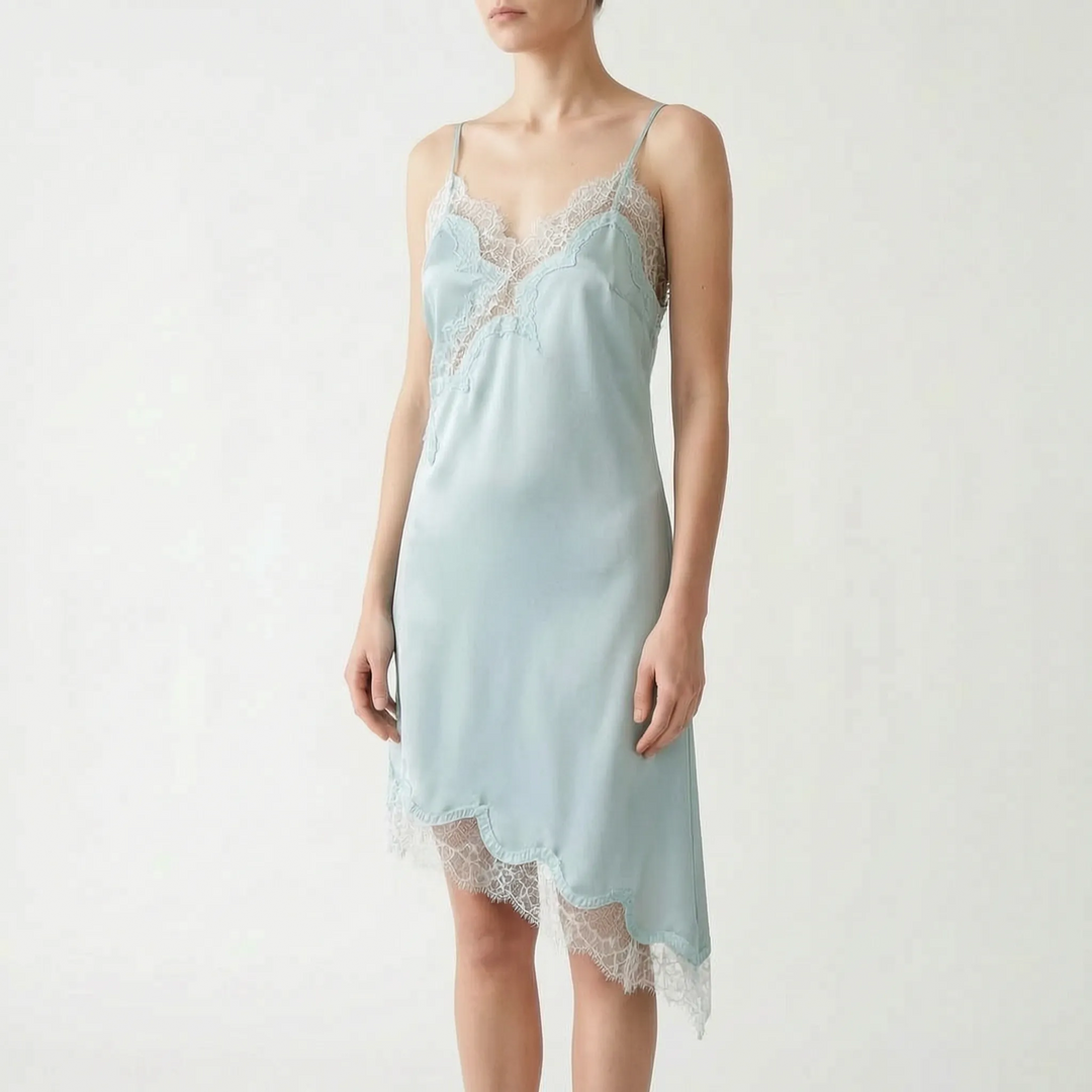 Chic women's asymmetric lace slip dress. Features a deep V-neck and delicate lace detailing for evenings.