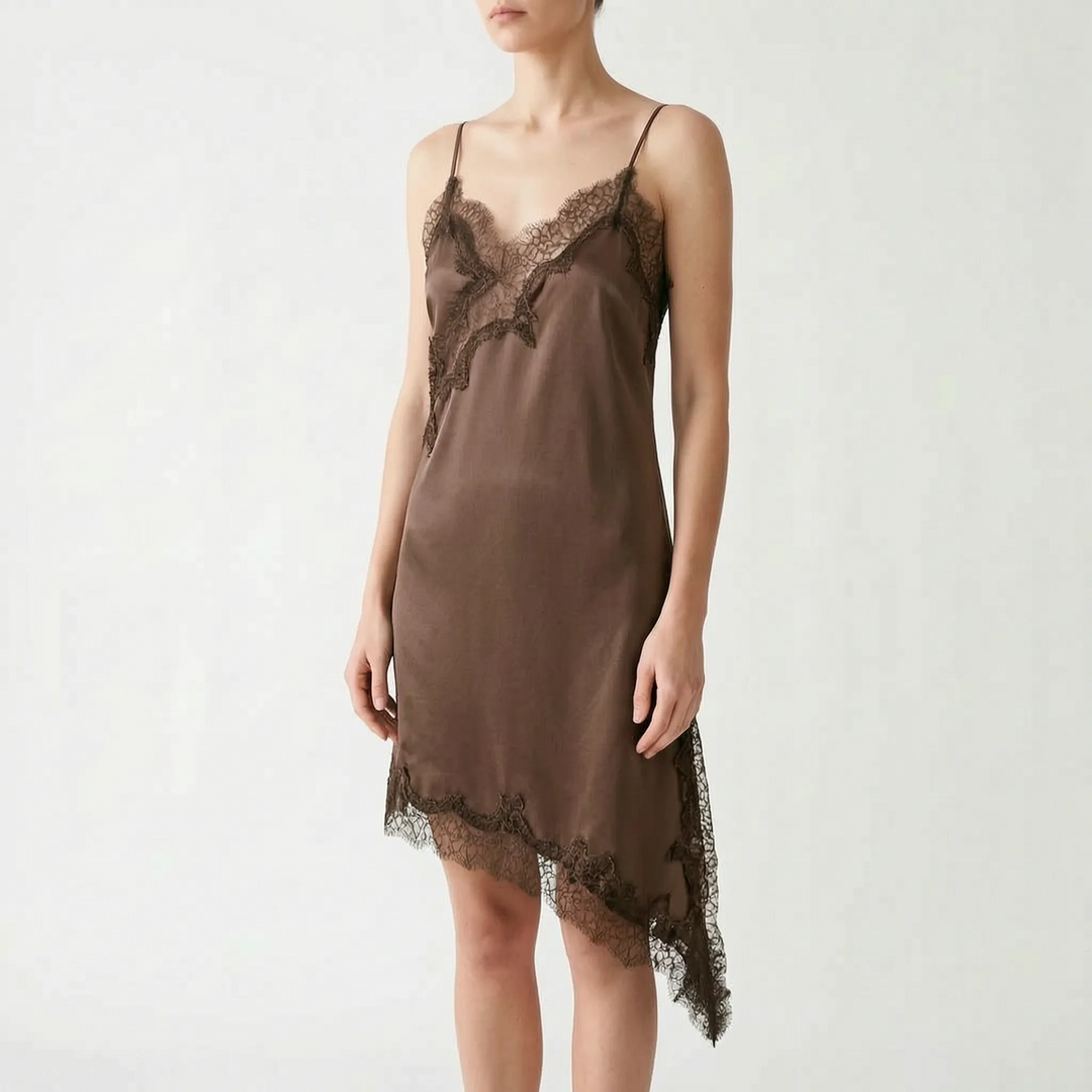 Versatile women's party or evening wear: elegant asymmetric lace slip dress with stylish V-neck.