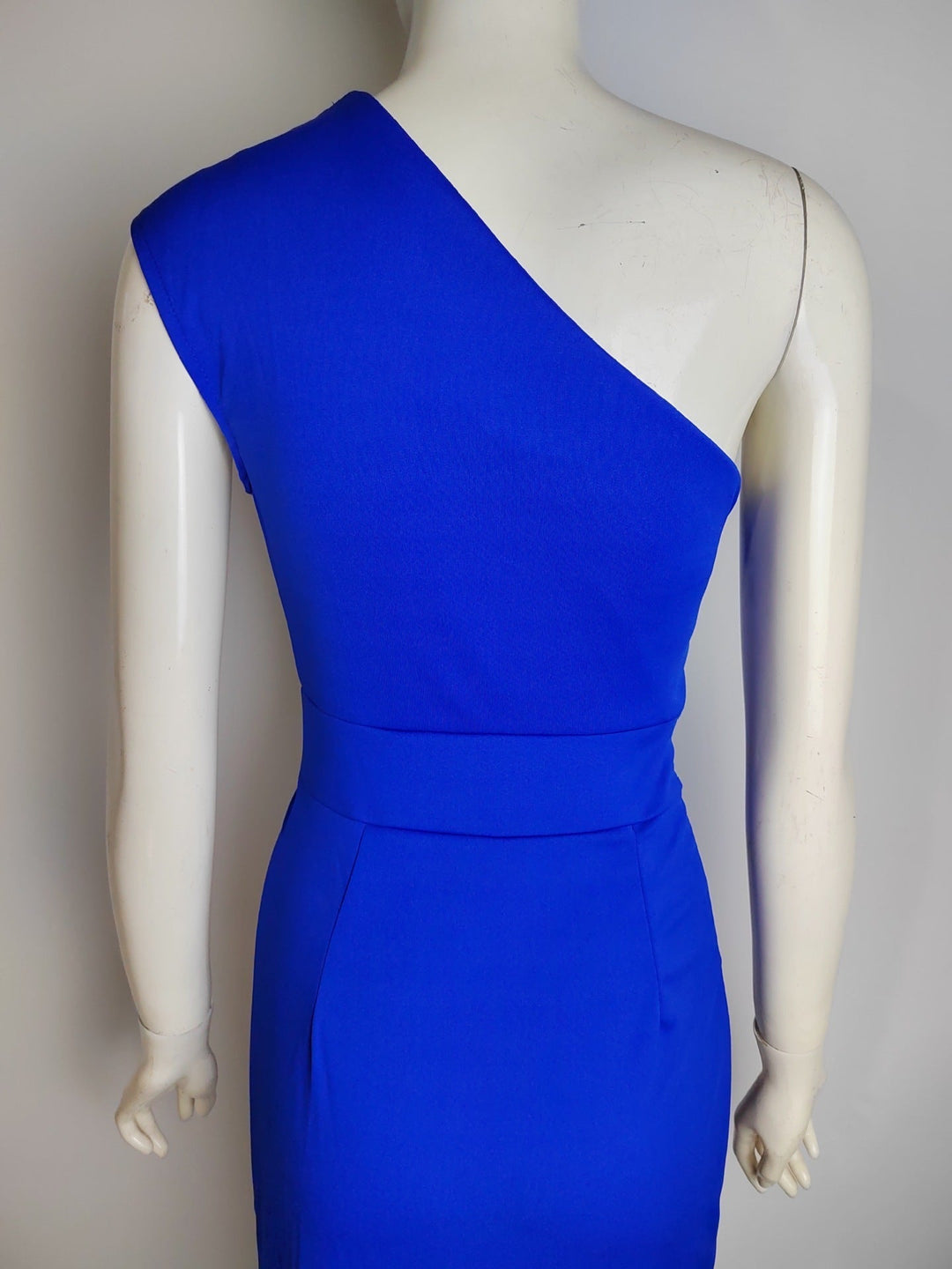 Stunning women's occasion wear: long formal evening gown, asymmetrical drape with a chic slit.