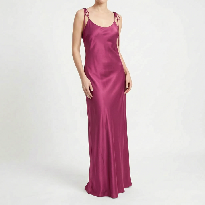 Stylish women's backless floor-length slip dress, ideal for elegant evenings, cocktails, or summer parties.
