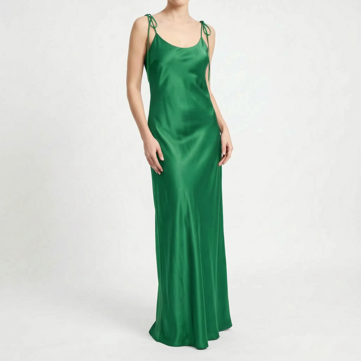 Graceful women's floor-length slip dress with a backless design, suitable for elegant evening wear.