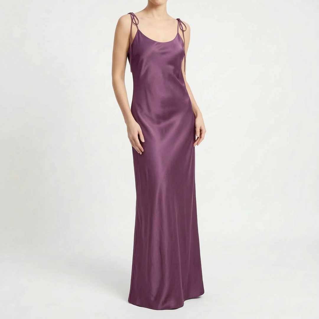 Chic women's backless floor-length evening gown. An elegant slip dress for formal events.